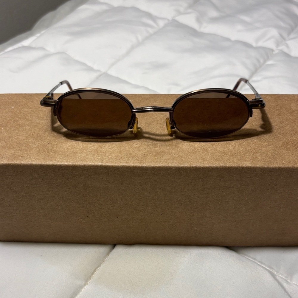 Vintage Nino Balli Gold Half Rim
Oval Eyeglasses with Sunglasses Clips - Picture 2 of 10